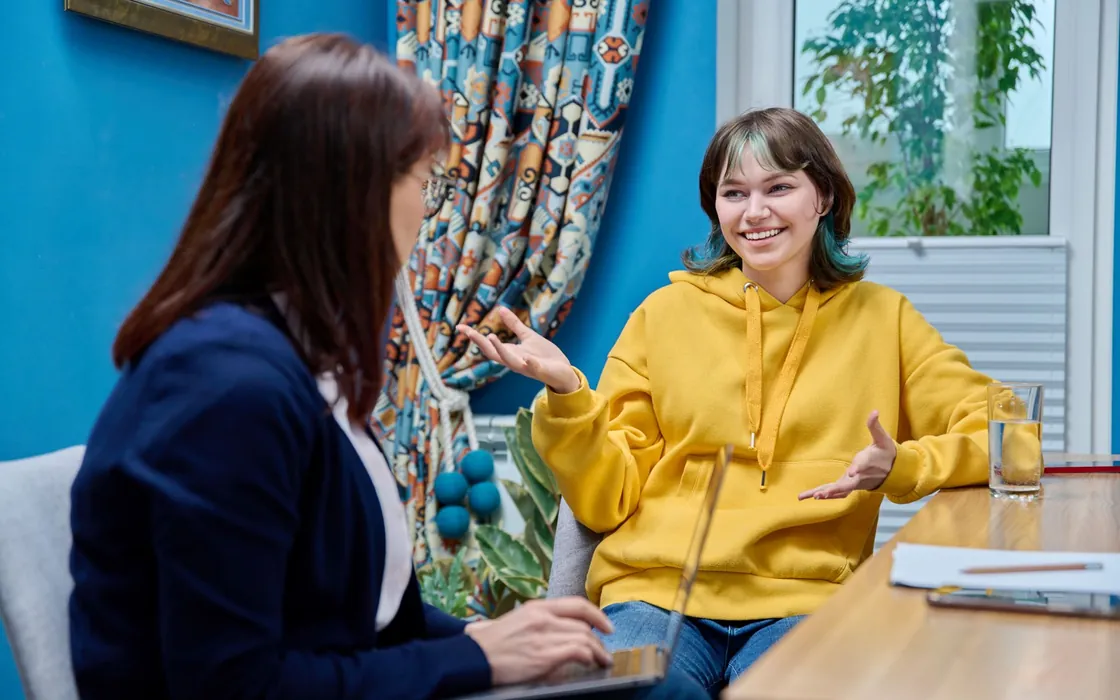 A student talking with a counsellor