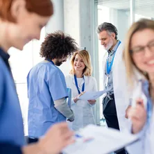 Doctors discussing at a conference