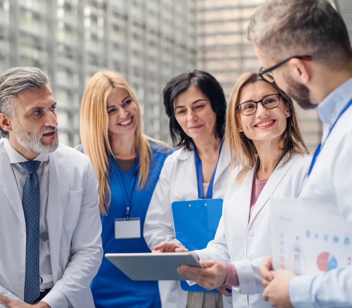 A medical team in discussion at a conference