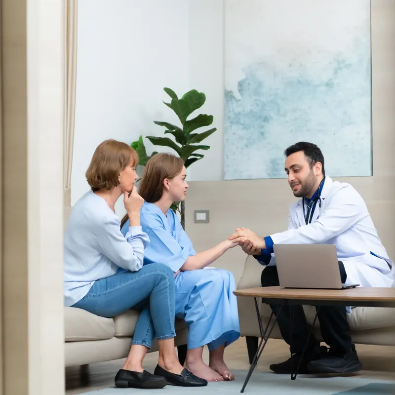 A mother, her daughter and their doctor in conversation