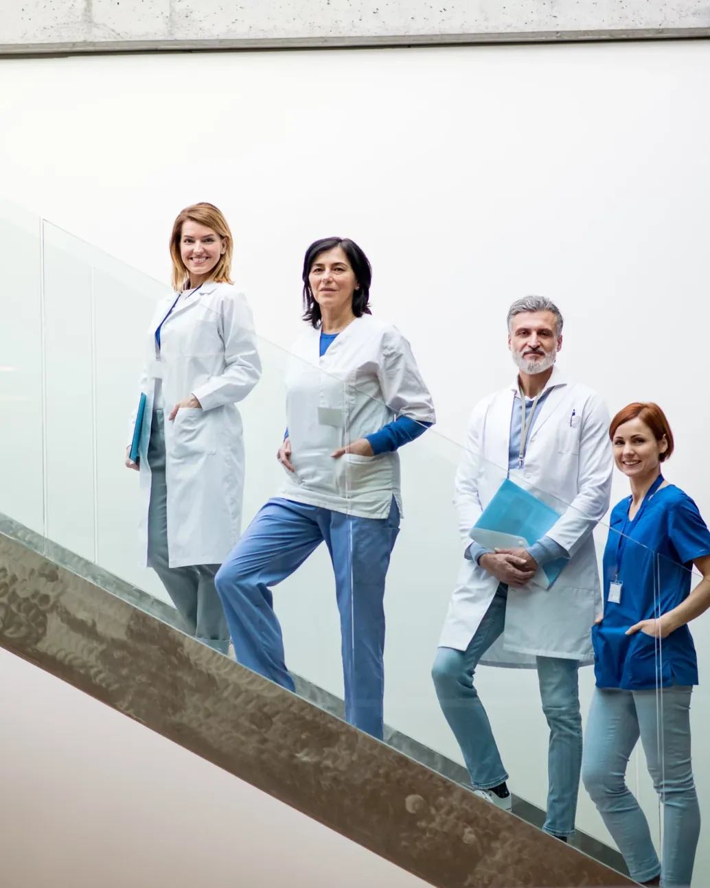A group of doctors on the stairs at a medical conference